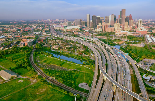 Aerial view of Houston area with view of greenbelt, highway, and downtown